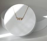 Holy Family Hearts® in 14K Gold Tiny Version