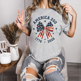 America 250 "Stars and Stripes" Bow T-Shirt – 2026 Semiquincentennial Graphic Tee, Premium 100% Cotton Patriotic Coquette Top, Soft Lived-In Heavyweight USA 250th Anniversary Shirt, Made in USA
