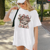 Highland Holly Tee – Cute Christmas Highland Cow Leopard Bow Graphic Shirt