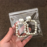 SUBGIU 50Pcs Anti Tarnish Jewelry Bags Clear Pvc Jewelry Storage Pouches with Zipper Plastic Packing for Earrings (Pvc Bracelet