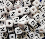 ChangJin 120PCS White Plastic Cube Alphabet Beads Black Letter 10x10mm W/4mm Hole for Jewelry Making (White Beads N 120PCS)