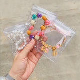 SUBGIU 100Pcs Anti Tarnish Jewelry Bags Clear Pvc Jewelry Storage Pouches with Zipper Plastic Packing for Earrings (Rings Bracel