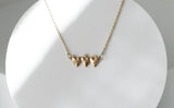 Holy Family Hearts® in 14K Gold Tiny Version