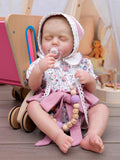 Cloveray Reborn Baby Dolls - 20 Inch Real Baby Dolls That Look Real, Full Body Vinyl Girl Doll in Purple Romper with Bow & Bonne