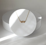Holy Family Hearts® in 14K Gold Tiny Version