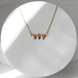 Holy Family Hearts® in 14K Gold Tiny Version