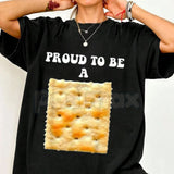 "Proud to Be a Cracker" Funny Holiday T-Shirt - Humorous Christmas Party Costume Tee, Premium 100% Cotton Sarcastic Pun Top, Witty Festive Nutcracker Style Shirt, Unique Holiday Gift for Him & Her, Soft Lived-In Heavyweight Casual Apparel