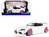 2025 Toyota GR Supra Liberty Walk Body Kit White Metallic with Pink Wheels 1/18 Diecast Model Car by Solido