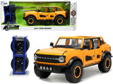 2021 Ford Bronco Orange Metallic with Extra Wheels Just Trucks Series 1/24 Diecast Model Car by Jada