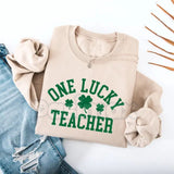 One Lucky Teacher Adult Sweatshirt | Green Varsity Lettering St Patrick's Day Crewneck | Shamrock Accent Teacher Pullover | Lucky Educator Holiday Outfit | Retro Varsity St Pattys Shirt | Soft Cozy Teacher Gift Jumper