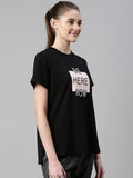 Enamor Athleisure Relaxed Fit Short Sleeve Round Neck Antimicrobial Finish Breathable Stretch Cotton Activewear Sports Tshirt for Women - A301 (A301_Jet Black/Be Here Graphic_S),Jet Black / Be Here