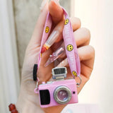 WARMINGO DE Mini Camera Keychain with Click Sound, Light & Smile Strap