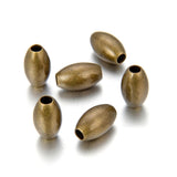 100pcs 12mm Smooth Oval Rice Loose Beads Metal Spacer Large Hole Antique Bronze Plated Brass for DIY Craft Jewelry Making CF257-