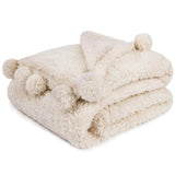 PAVILIA Soft Sherpa Twin Blanket with Pom Pom for Couch Bed, Beige, 60x80