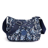 Nawoshow Nylon Floral Multi-Pocket Crossbody Purse Bags for Women Travel Shoulder Bag (Blue Flower)