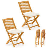 Tangkula 2 Pieces Folding Outdoor Dining Chairs, Acacia Wood Patio Chairs with Soft Cushions, Slatted Backrests and Seats, Outdo