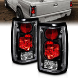 Amerilite Black Euro Tail Lights For 1986-1993 Mazda B2000 Seried Pick Up Truck - Passenger And Driver Side -Like New