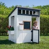 Backyard Discovery Caraway Cottage White Cedar Wooden Kids Playhouse with Play Kitchen, Chalkboard, Mailbox, Half Door, Windows,