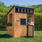 Backyard Discovery Caraway Cottage Cedar Wooden Kids Playhouse with Play Kitchen, Chalkboard, Mailbox, Half Door, Windows, Flowe