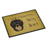 Caroline'S Treasures Bb1461Mat Longhair Black And Tan Dachshund Spoiled Dog Lives Here Indoor Or Outdoor Mat, 18 X 27, Mul