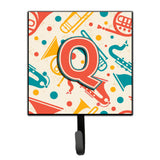 Caroline'S Treasures Cj2001-Qsh4 Letter Q Retro Teal Orange Musical Instruments Initial Leash Or Key Holder, Small, Multicolor