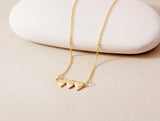 Holy Family Hearts® in 14K Gold Tiny Version