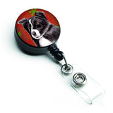 Caroline'S Treasures Border Collie Red & Green Snowflake Christmas Badge Reel, Multicolor (Sc9407Br)