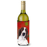 Welsh Springer Spaniel Snowflakes Holiday Christmas Wine Bottle Beverage Insulator Beverage Insulator Hugger