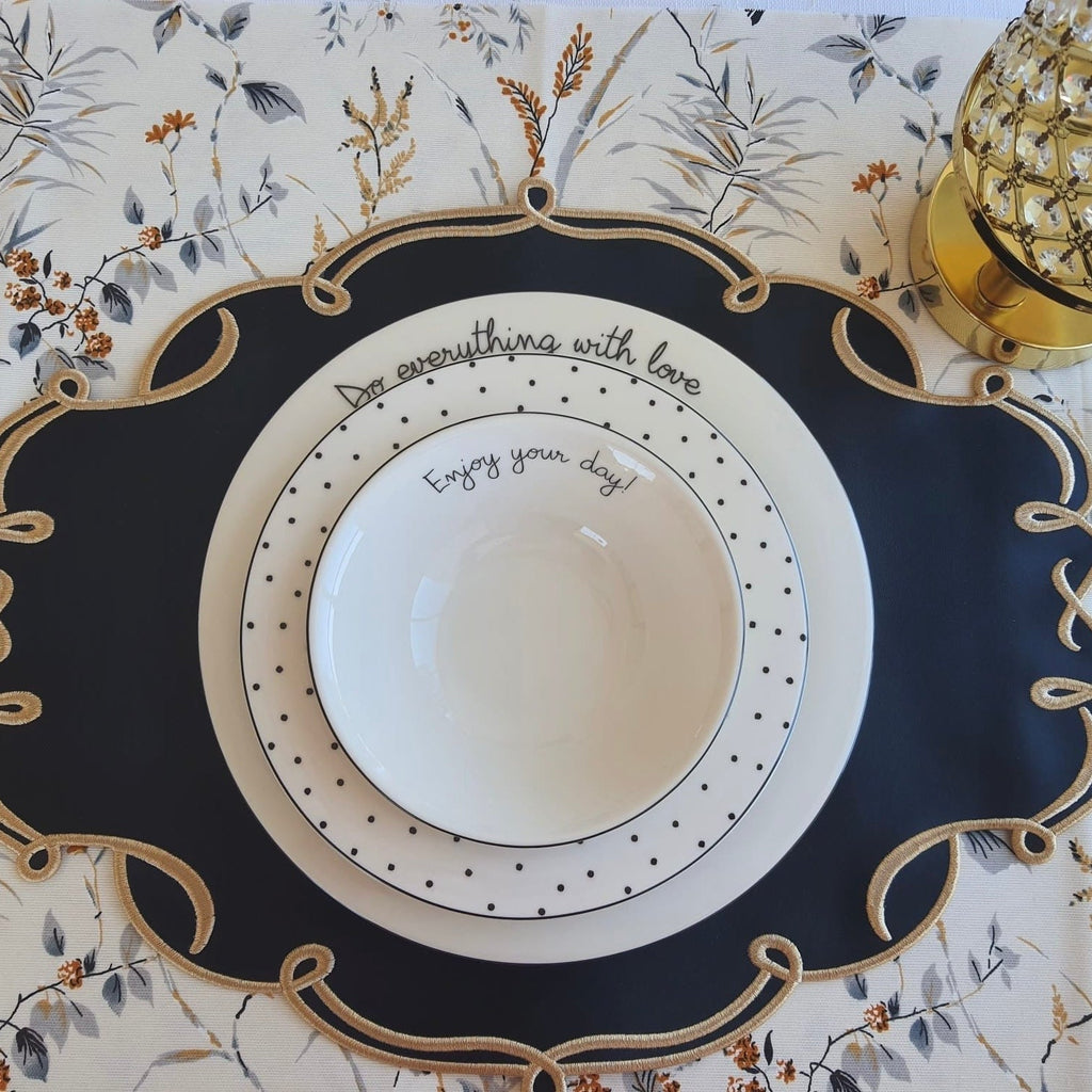 CELESTIA BLACK OVAL FAUX LEATHER PLACEMAT & NAPKIN & COASTER SET