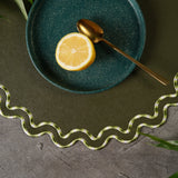 ELYSIAN DARK GREEN ROUND FAUX LEATHER PLACEMAT