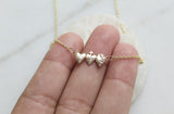 Holy Family Hearts® in 14K Gold Tiny Version