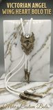 VICTORIAN ANGEL WING HEART BOLO TIE ~ PURPLE FLORAL ACCENT